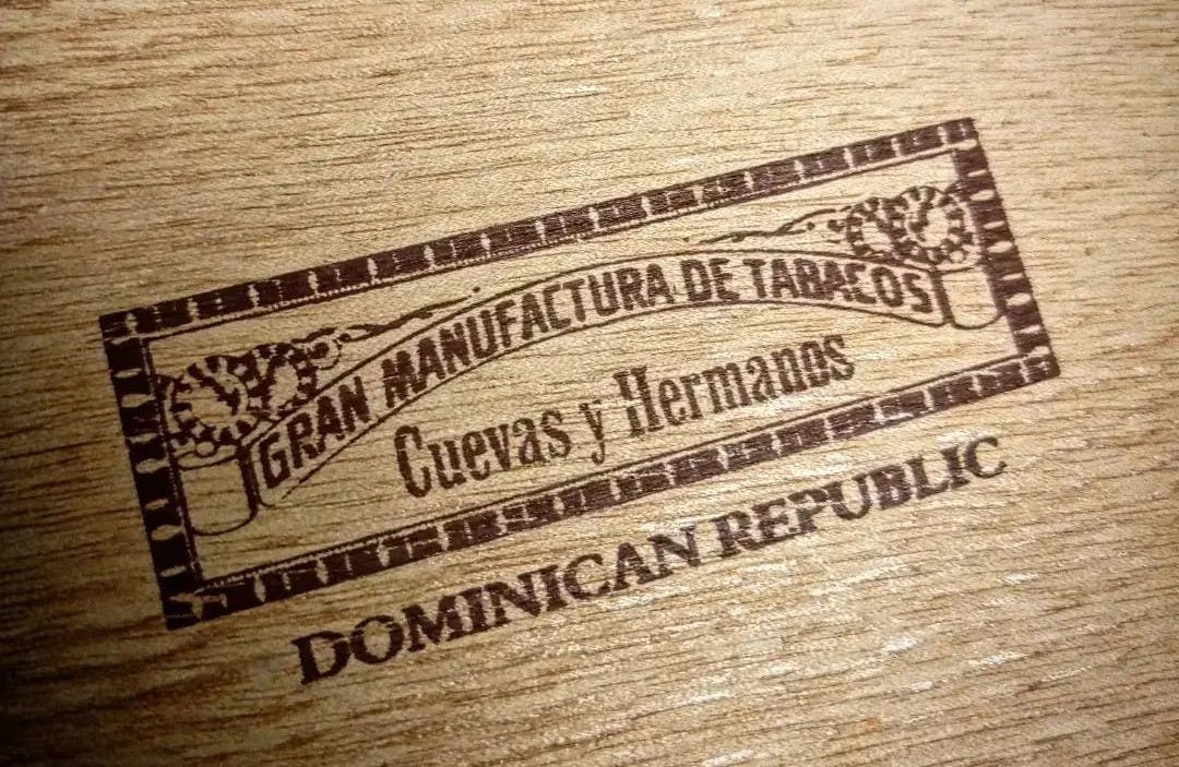 Engraved logo on wooden cigar box